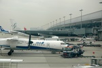 All Nippon DHC8 in front of Starflyer A320 at KIX/RJBB.